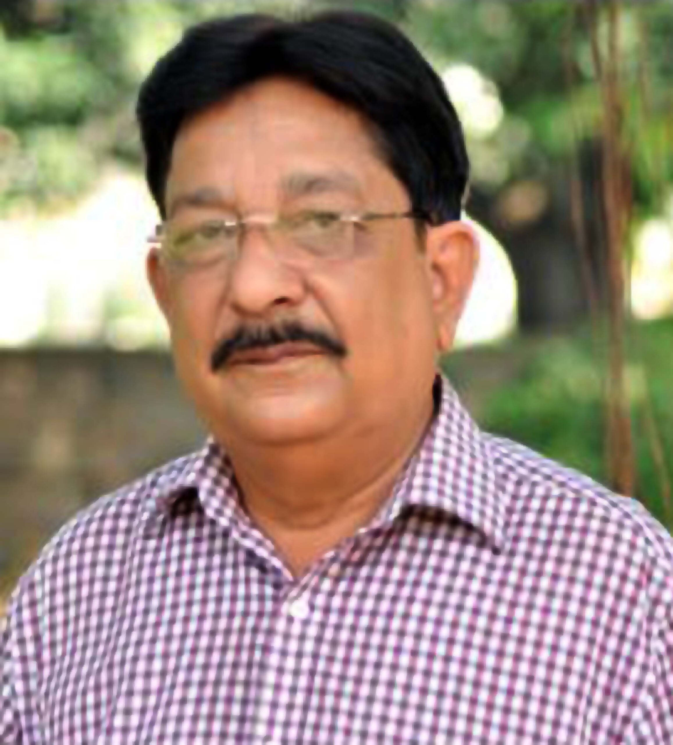 Portrait of Yogindra Mohan